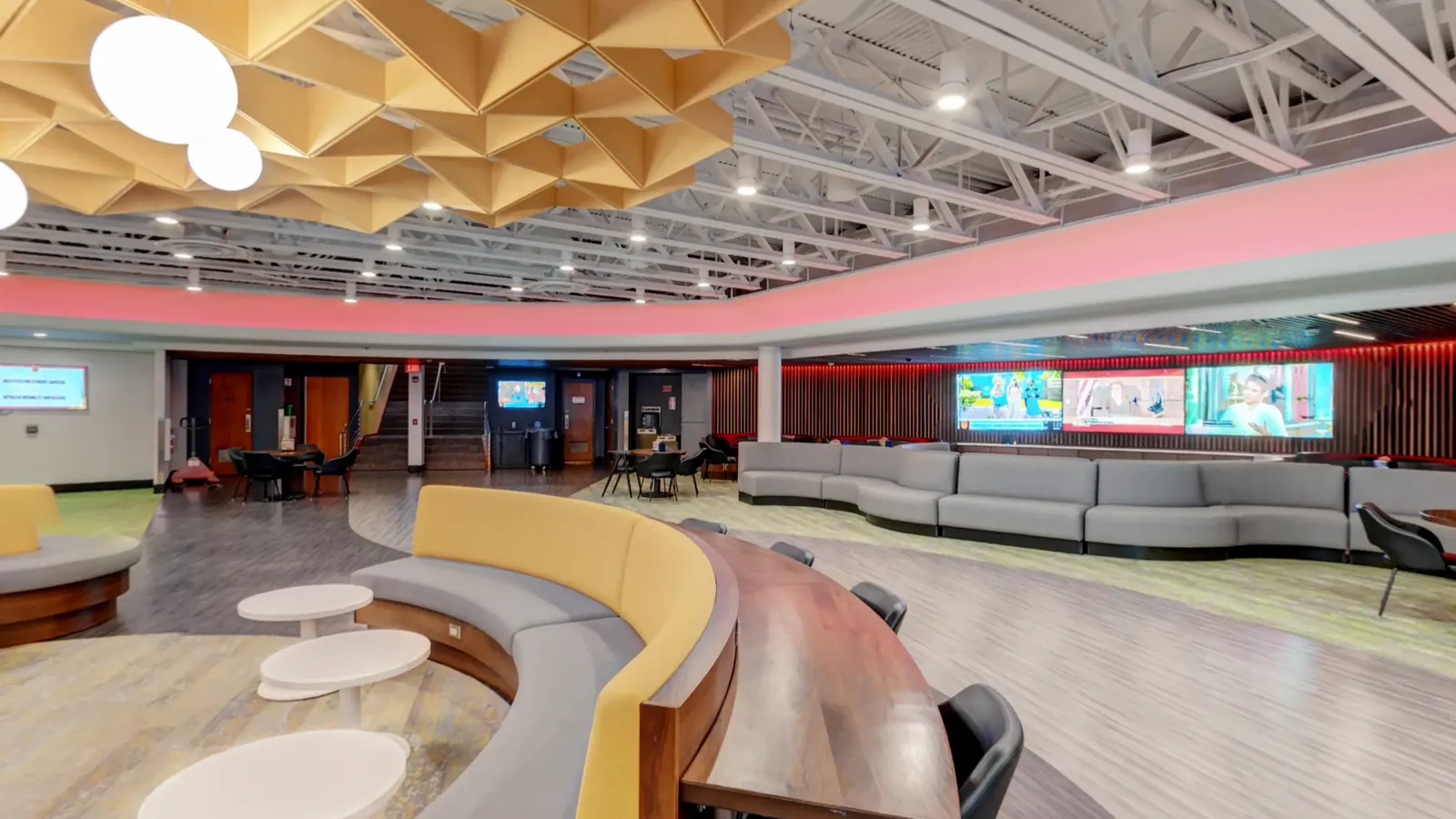 The curved lounge seating on the lower level