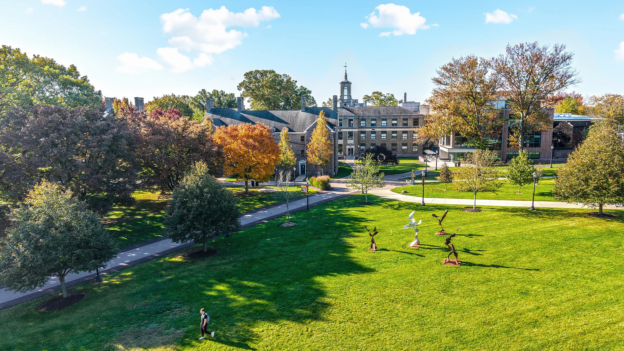 The Ursinus College campus in autumn, looking across the lawn toward Bomberger Hall