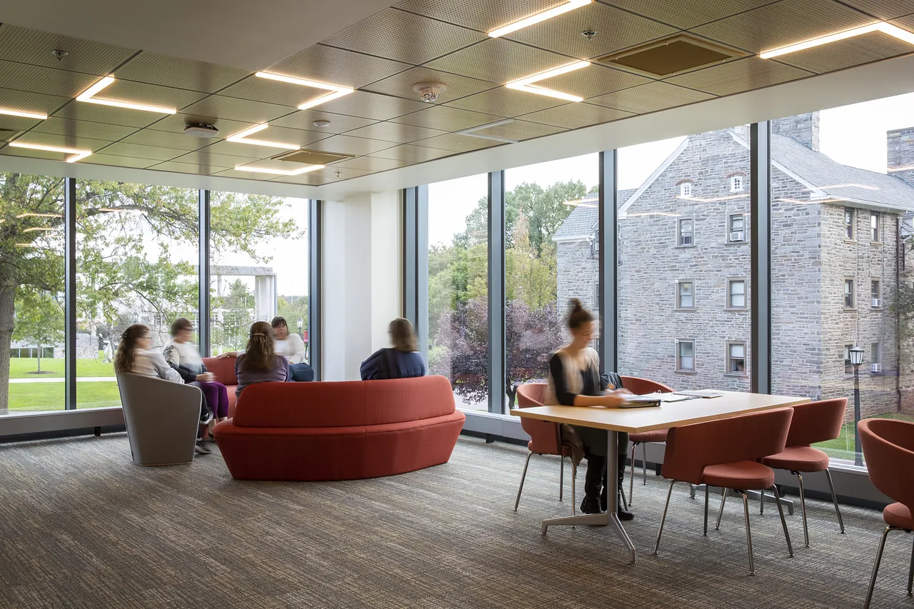 A glass-walled meeting room in the Innovation and Discovery Center