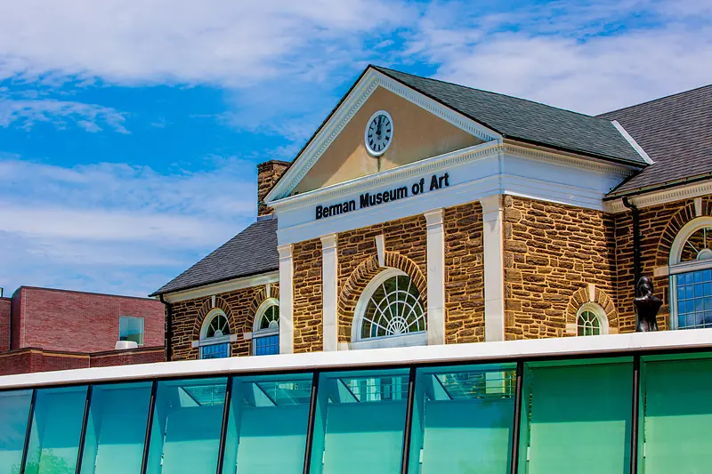 The clock gable and entrance of the Berman Museum of Art