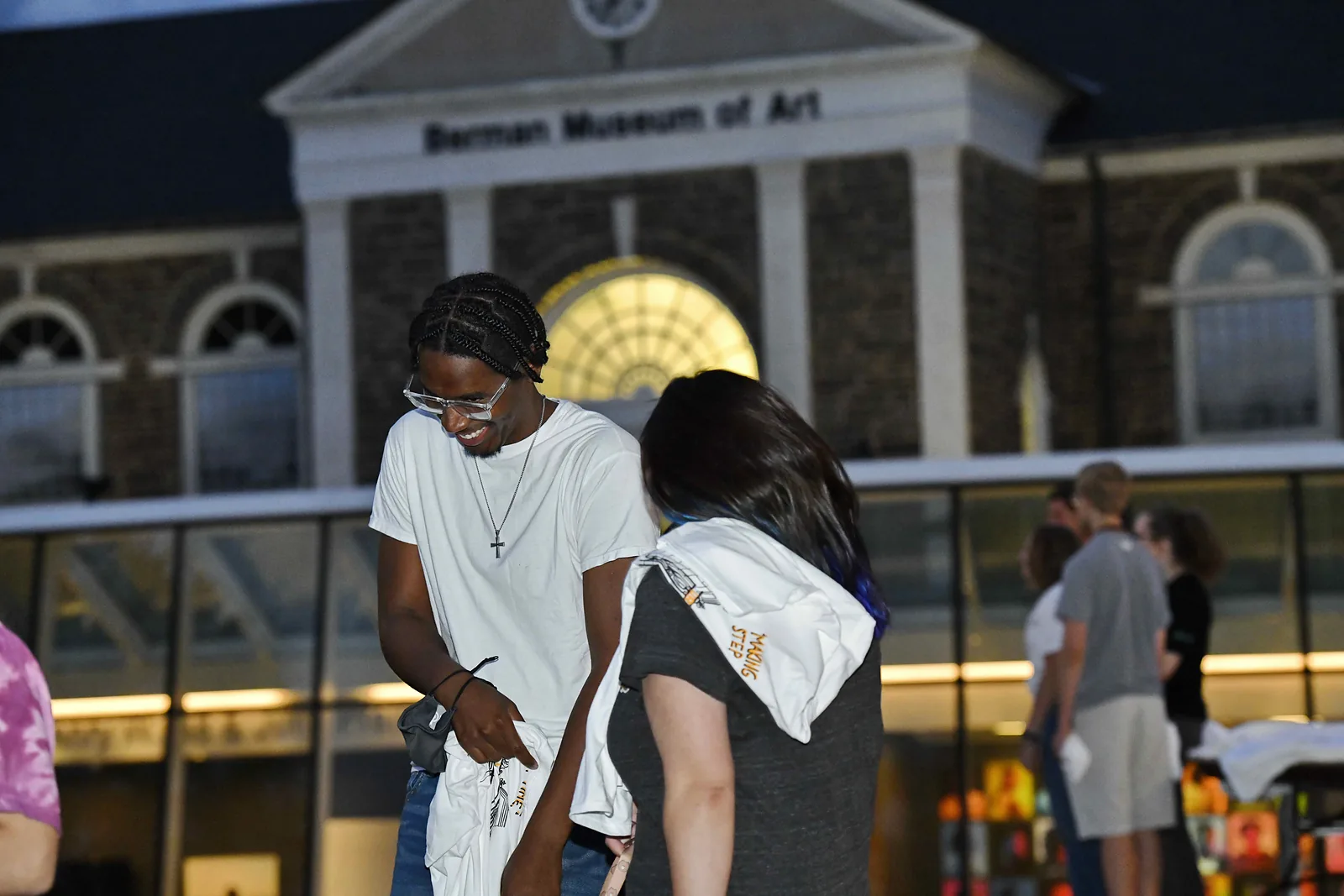 Guests gathered outside the Berman Museum of Art for an evening event