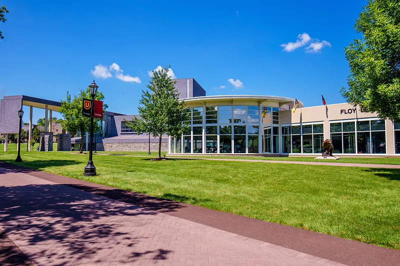 The Floy Lewis Bakes Center seen from the campus path