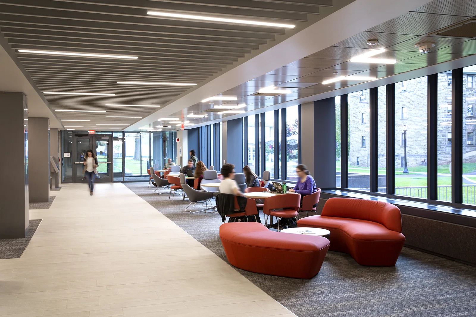 Inside the Innovation and Discovery Center at Ursinus College — the day-lit lobby and glass meeting rooms