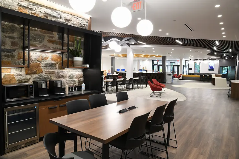 A meeting room and kitchenette in the renovated Myrin Library