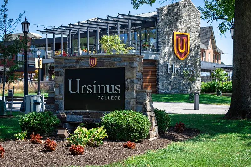 The Ursinus College sign in front of Schellhase Commons