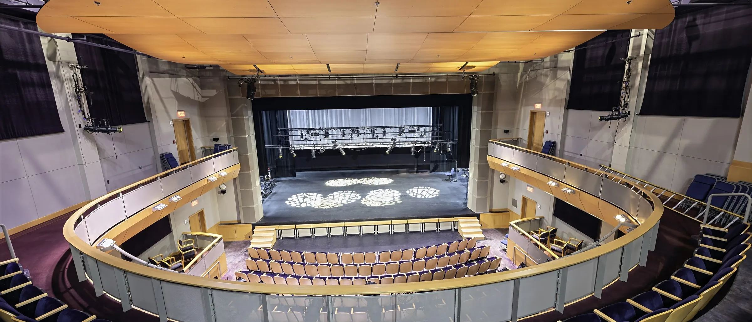 The curved balcony of the Lenfest Theater above its stage